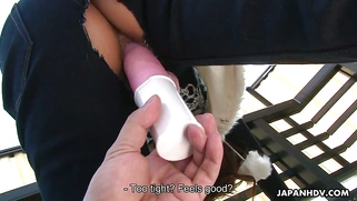 Emiri Seo gets her hairy pussy dildoed through the hole in her pants