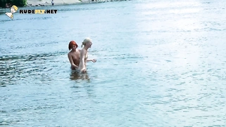 Skinny and young nudist ladies fool around on the beach