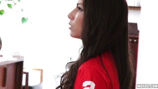 Miss Rican in a panties and footbal team t-shirt plays a video game