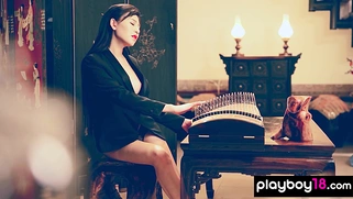 Chinese porcelain doll shows her pussy