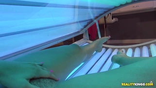 Violet Starr masturbates in the tanning bed while taking selfies