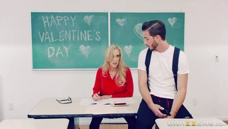 Brandi Love grades papers and rides her dildo at the same time