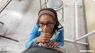 Rhae Woods on her knees is sucking black dick