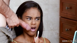 Ebony Scarlit S. is sucking the white cock in the bathroom