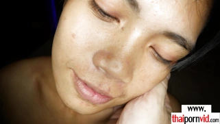 Amateur Thai MILF satisfying a farang