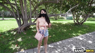 Asian Mina Moon is getting picked up outdoors