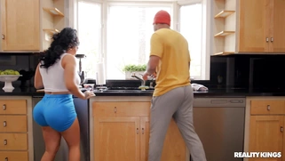 Tokyo Lynn is sucking the black cock in the kitchen