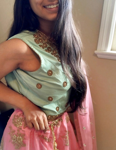 Little Indian girl taking it all off