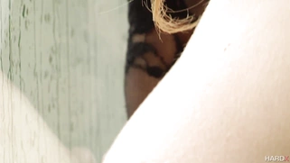 Jillian Janson wearing gloves shows us her fantastic body