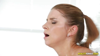 Katerina's 34EE natural juggs bounce all around the room as she rides the cock