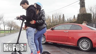 Megan Fiore jerks off Jordi ENP while riding an electric scooter down an empty road