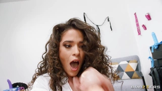 Latina Victoria Voxxx is playing with the toys