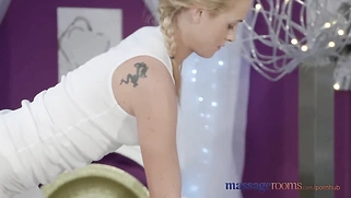 Horny blonde gives her client with a big cock an expert handjob