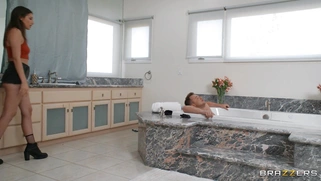 Maya Woulfe and Van Wylde have fun in bathtub