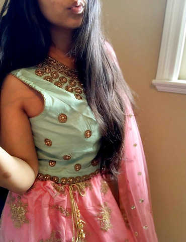 Little Indian girl taking it all off