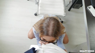 Zlata Shine in glasses is sucking cock in POV
