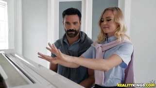 Kenzie Kai takes piano lessons from Charles Dera