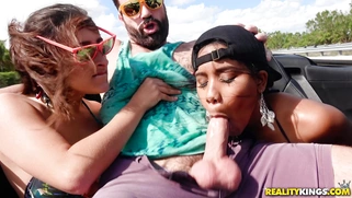 Ashley Adams and Jenna J Foxx suck Charles Dera in the moving car