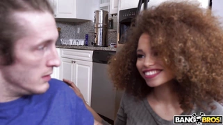 Ebony Cecilia Lion on her knees sucks the big white prick