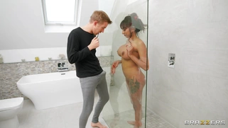 Asia is sucking Danny D's monster cock in the bathroom